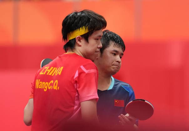 (260928) -- TOYOTA, Sept. 28, 2026 -- Lin Shidong (R) of China greets Wang Chuqin of China after the men s singles final match of Table tennis, Tischtennis at the 20th Asian Games Aichi-Nagoya 2026 in Toyota of Aichi Prefecture, Japan, Sept. 28, 2026. ) (SP)JAPAN-TOYOTA-ASIAN GAMES-TABLE TENNIS-MEN S SINGLES WangxFei 