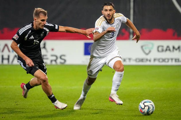 September 28, 2026, RÄÂ«Ga, Latvija: Latvian player DMITRIJS ZELENKOVS (L) vies with NIKOLAOS PANAGIOTOU of Cyprus during UEFA Nations League Ã¢â‚¬ League C match in Riga, Latvia, Sept. 28, 2026. RÄÂ«Ga Latvija - ZUMAp305 20260928_zip_p305_007 Copyright: xEdijsxPalensx