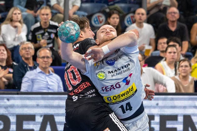 Head-to-head between Florian Scheerer (HC Erlangen, 10) and Peter Walz (ThSV Eisenach, 14), GER; HC Erlangen vs. ThSV Eisenach, Handball, Opel Handball Bundesliga, Matchday 6, 2026–2027 Season, September 28, 2026, GER, HC Erlangen vs. ThSV Eisenach, Handball, Opel Handball Bundesliga, Matchday 6, 2026–2027 season, September 28, 2026, Nuremberg Copyright: xEibner-Pressefoto ArdanxFuessmanx EP_AFN
