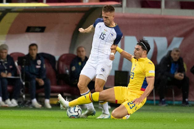Monday, 28 Sep 2026, UEFA Nations League 2026, League phase, Matchday 2 League B, Group B4 Romania vs Bosnia and Herzegovina, National Arena Stadium, Bucharest, Romania 23 Lisav Eissat puts in a tackle on 15 Amar Memic