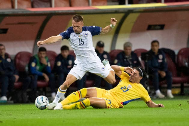 Monday, 28 Sep 2026, UEFA Nations League 2026, League phase, Matchday 2 League B, Group B4 Romania vs Bosnia and Herzegovina, National Arena Stadium, Bucharest, Romania 23 Lisav Eissat puts in a tackle and clears a loose ball