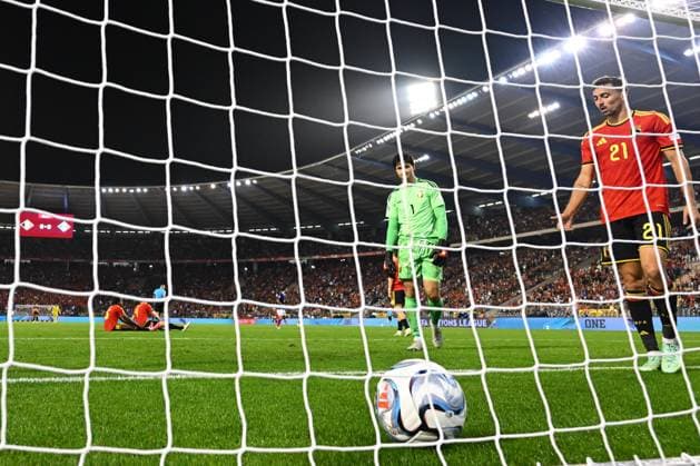 Belgium v France - UEFA Nations League 2026 BRUSSELS, BELGIUM - SEPTEMBER 28 : Castagne Timothy defender of Belgium, Lammens Senne goalkeeper of Belgium, Olise Michael midfielder of France scores a goal during the UEFA Nations League tournament league phase matchday 2 group A1 match between Belgium and France on September 28, 2026 in Brussels, Belgium, 28 09 2026 Brussels Belgium  Copyright: xVincentxKalutx