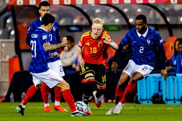 BRUSSELS, Belgium: Belgian midfielder Joaquin Seys and French defender Pierre Kalulu during the UEFA Nations League match between Belgium and France at King Baudouin Stadium on September 28, 2026, in Brussels, Belgium. Photo by DeFodi Images
