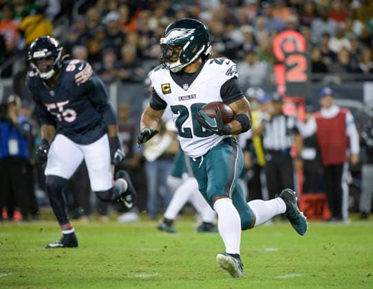 Philadelphia Eagles running back Saquon Barkley (26) runs the ball against the Chicago Bears in the first quarter during a game at Soldier Field in Chicago on Monday, September 28, 2026.  CHI20260928104 MARKxBLACK