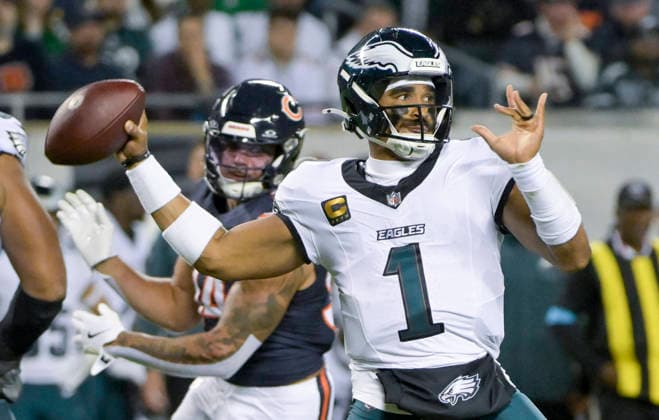 Philadelphia Eagles quarterback Jalen Hurts (1) passes the ball against the Chicago Bears in the second quarter at Soldier Field in Chicago on Monday, September 28, 2026.  CHI20260928105 MARKxBLACK