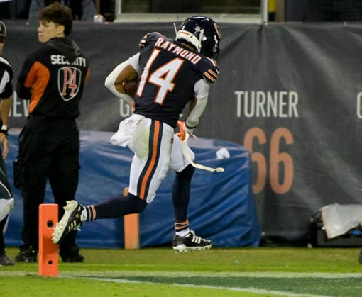 Chicago Bears wide receiver Kalif Raymond (14) scores a third quarter touchdown against the Philadelphia Eagles at Soldier Field in Chicago on Monday, September 28, 2026. Bears defeated the Eagles 27-7.  CHI20260928109 MARKxBLACK