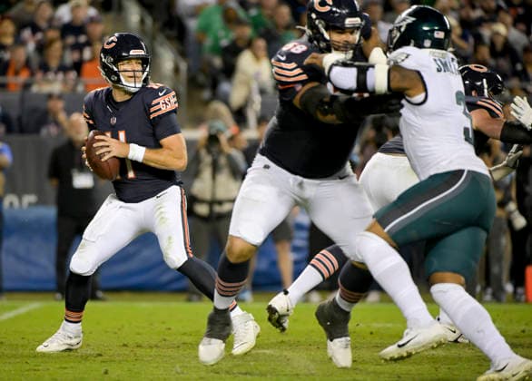 Chicago Bears quarterback Case Keenum (11) looks for an open receiver against the Philadelphia Eagles at Soldier Field in Chicago on Monday, September 28, 2026. Bears defeated the Eagles 27-7.  CHI20260928113 MARKxBLACK