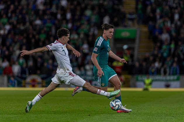 Northern Ireland v Hungary - UEFA Nations League 2026 27 Group B2 MD2 Tamas Szucs of Hungary competes for the ball with Justin Devenny of Northern Ireland during the UEFA Nations League match at Windsor Park in Belfast, on September 28, 2026. Belfast United Kingdom  Copyright: xRobertxSzaniszlox originalFilename:szaniszlo-notitle260928_np0Ii.jpg