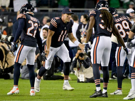 Third string Chicago Bears quarterback Case Keenum (11) turned starter for Monday Night Football runs onto the field to play Philadelphia Eagles at Soldier Field in Chicago on Monday, September 28, 2026. Bears defeated the Eagles 27-7.  CHI20260928121 MARKxBLACK