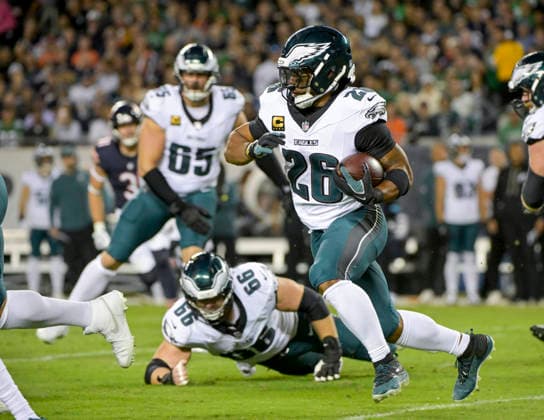 Philadelphia Eagles running back Saquon Barkley (26) runs the ball against the Chicago Bears in the first quarter at Soldier Field in Chicago on Monday, September 28, 2026. Bears defeated the Eagles 27-7.  CHI20260928126 MARKxBLACK