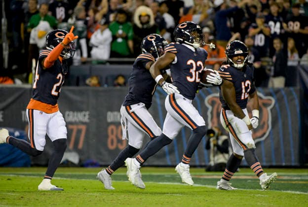 Chicago Bears free safety Xavier Woods (32) celebrates a first half interception against the Philadelphia Eagles at Soldier Field in Chicago on Monday, September 28, 2026. Bears defeated the Eagles 27-7.  CHI20260928127 MARKxBLACK