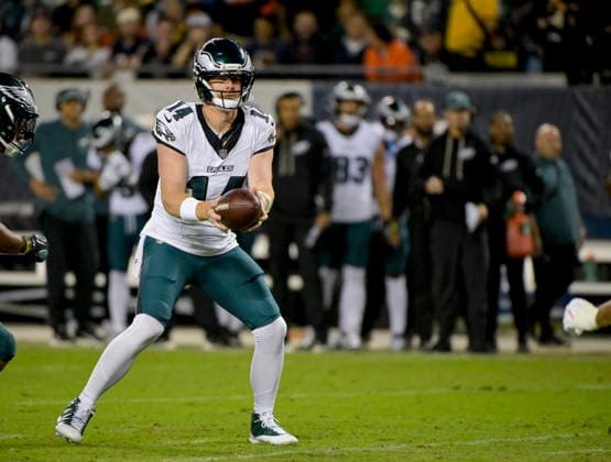 Philadelphia Eagles quarterback Andy Dalton (14) takes the snap against the Chicago Bears at Soldier Field in Chicago on Monday, September 28, 2026. Bears defeated the Eagles 27-7.  CHI20260928131 MARKxBLACK