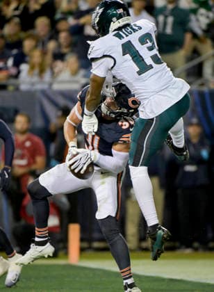 Chicago Bears safety Dillon Thieneman (31) intercepts the ball intended for Philadelphia Eagles quarterback Andy Dalton (14) during the first half at Soldier Field in Chicago on Monday, September 28, 2026. Bears defeated the Eagles 27-7.  CHI20260928132 MARKxBLACK