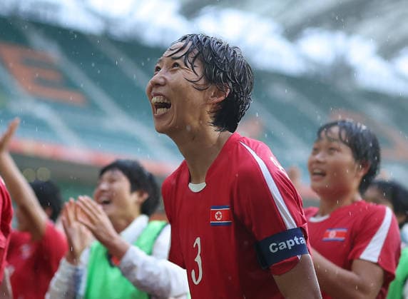 (260929) -- SHIZUOKA, Sept. 29, 2026 -- Ri Kum Hyang of the Democratic People s Republic of Korea (DPRK) celebrates after the women s semifinal football match between China and the Democratic People s Republic of Korea (DPRK) at 20th Asian Games Aichi-Nagoya 2026 in Fukuroi of Shizuoka Prefecture, Japan, Sept. 29, 2026. ) (SP)JAPAN-SHIZUOKA-ASIAN GAMES-FOOTBALL-WOMEN S SEMIFINAL-CHN VS PRK JiaxHaocheng 