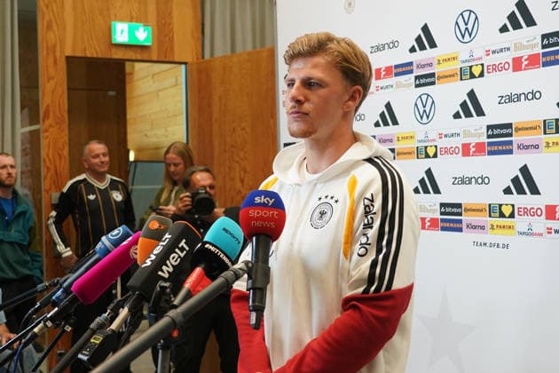 Finn Jeltsch (Germany) in an interview with the Mixed Zone at the kickoff of the second national team camp for the Nations League at Herzo Base on September 29, 2026. German National Team, Nations League Preparation, Home Ground, HerzoBase, World of Adidas, Herzogenaurach