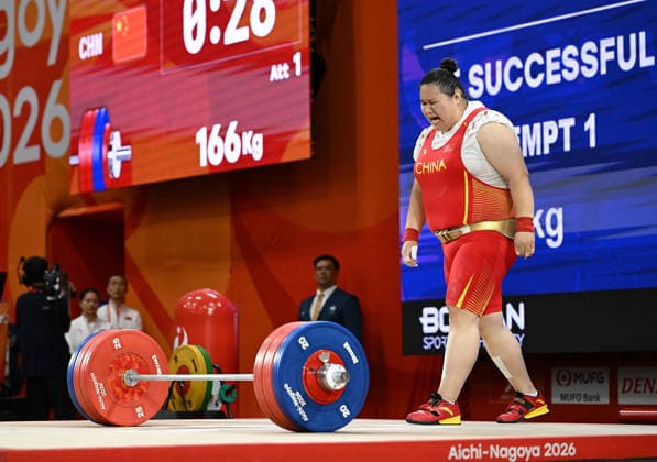 (260929) -- NAGOYA, Sept. 29, 2026 -- Li wenwen of China reacts after the women s +86kg final of weightlifting at the 20th Asian Games Aichi-Nagoya 2026 in Nagoya, Japan, Sept. 29, 2026. ) (SP)JAPAN-NAGOYA-ASIAN GAMES-WEIGHTLIFTING-WOMEN S +86KG-FINAL YuxYang 