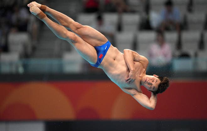 (260929) -- TOKYO, Sept. 29, 2026 -- Zheng Jiuyuan of China competes during the men s 3m springboard final of diving at the 20th Asian Games Aichi-Nagoya 2026 in Tokyo, Japan, Sept. 29, 2026. (Photo by Xinhua) (SP)JAPAN-TOKYO-ASIAN GAMES-DIVING-MEN S 3M SPRINGBOARD-FINAL WangxShen 