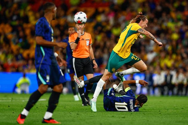 SOCCER AUSTRALIA BRAZIL, Raphael Dias Belloli of Brazil is tackled by Jackson Irvine of Australia during the Queensland Football Series International Friendly, Länderspiel, Nationalmannschaft match between the Socceroos and Brazil at Suncorp Stadium in Brisbane, Tuesday, September 29, 2026. ( NO ARCHIVING, EDITORIAL USE ONLY  Copyright: xRUSSELLxFREEMANx 20260929168627371177