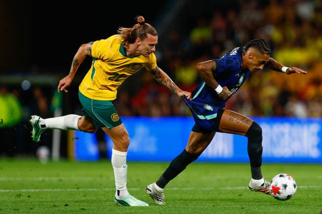 SOCCER AUSTRALIA BRAZIL, Raphael Dias Belloli of Brazil is tackled by Jackson Irvine of Australia during the Queensland Football Series International Friendly, Länderspiel, Nationalmannschaft match between the Socceroos and Brazil at Suncorp Stadium in Brisbane, Tuesday, September 29, 2026. ( NO ARCHIVING, EDITORIAL USE ONLY  Copyright: xRUSSELLxFREEMANx 20260929131730632415