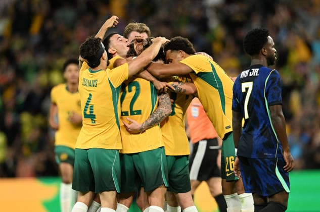SOCCER AUSTRALIA BRAZIL, Connor Metcalfe of the Socceroos celebrates scoring a goal with team mates during the Queensland Football Series International Friendly, Länderspiel, Nationalmannschaft match between the Australian Socceroos and Brazil at Suncorp Stadium in Brisbane, Tuesday, September 29, 2026. ( NO ARCHIVING, EDITORIAL USE ONLY BRISBANE QUEENSLAND Australia  Copyright: xDARRENxENGLANDx 20260929177791283945