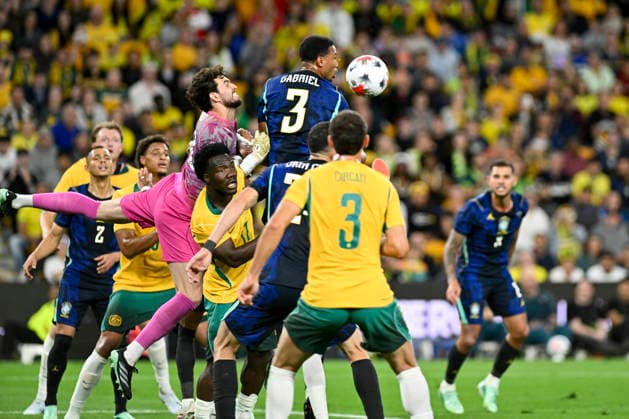 29th September 2026; Suncorp Stadium, Brisbane, Australia; Friendlies Football, Australia versus Brazil; Gabriel Magalhaes of Brazil clears the corner as Otavio of Brazil struggles to reach the ball NigelxOwen