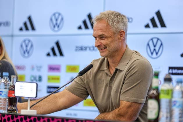 GER, Frankfurt, press conference with Nia Künzer, Christian Wück, and Michael Urbansky, hybrid media session, DFB, Start of the World Cup season, German national team, DFB Campus in pictures: Christian Wück, head coach of the German national team, German national team, DFB press conference, press conference marking the start of the World Cup season for the German women’s national team and the U23 team at the DFB Campus, emotion, Laughter, Joy DFB DFL REGULATIONS PROHIBIT ANY USE OF PHOTOGRAPHS AS IMAGE SEQUENCES AND OR QUASI-VIDEO, September 29, 2026 Copyright: HMBxMedia HendrikxHamelau