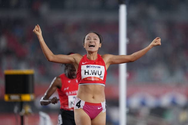 (260929) -- NAGOYA, Sept. 29, 2026 -- Wu Hongjiao of China reacts after the women s 800m final of athletics at the 20th Asian Games Aichi-Nagoya 2026 in Nagoya, Japan, Sept. 29, 2026. ) (SP)JAPAN-NAGOYA-ASIAN GAMES-ATHLETICS-WOMEN S 800M-FINAL LuixSiuxWai 