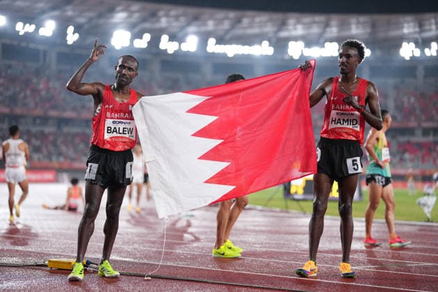 (260929) -- NAGOYA, Sept. 29, 2026 -- Birhanu Balew (L) and Abdikani Hamid of Bahrain celebrate after the men s 5000m final of athletics at the 20th Asian Games Aichi-Nagoya 2026 in Nagoya, Japan, Sept. 29, 2026. ) (SP)JAPAN-NAGOYA-ASIAN GAMES-ATHLETICS-MEN S 5000M LuixSiuxWai 