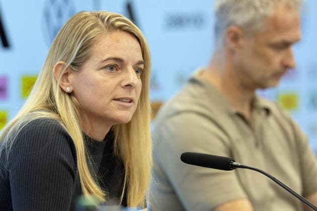 DFB Women s National Team Roster Announcement Press Conference: DFB Sports Director Nia Künzer speaks during the press conference; in the background on the right is National Team Coach Christian Wück. Press conference at the DFB Campus in Frankfurt am Main on September 29, 2026; Frankfurt am Main, Hesse, Germany; DFB Campus