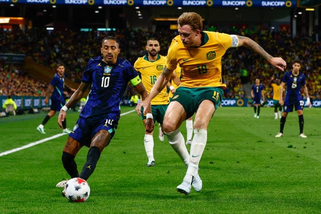 SOCCER AUSTRALIA BRAZIL, Raphinha of Brazil and Harry Souttar of Australia compete for the ball during the Queensland Football Series International Friendly, Länderspiel, Nationalmannschaft match between the Socceroos and Brazil at Suncorp Stadium in Brisbane, Tuesday, September 29, 2026. ( NO ARCHIVING, EDITORIAL USE ONLY  Copyright: xRUSSELLxFREEMANx 20260929117452880227