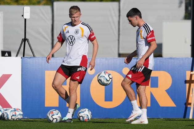 Jonathan Burkardt, Germany, with Felix Keidel, Germany, at Herzo Base, September 29, 2026—German National Team Nations League Preparation, Home Ground, HerzoBase, World of Adidas, Herzogenaurach
