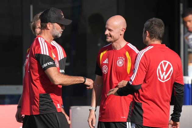 German National Team Coach Jürgen Klopp discusses matters with his coaching staff at Herzo Base on September 29, 2026. German National Team Nations League preparation, Home Ground, HerzoBase, World of Adidas, Herzogenaurach