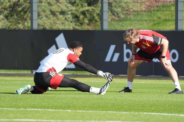 Goalkeeper Noah Atubolu (Germany) with goalkeeper coach Stefan Wessels (Germany) at Herzo Base on September 29, 2026: German National Team Nations League Preparation, Home Ground, HerzoBase, World of Adidas, Herzogenaurach