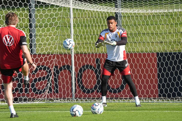 Goalkeeper Noah Atubolu (Germany) with goalkeeper coach Stefan Wessels (Germany) at HerzoBase on September 29, 2026: German National Team Nations League preparation, Home Ground, HerzoBase, World of Adidas, Herzogenaurach