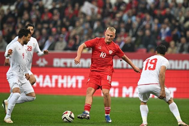 Russia Soccer Friendly Russia - Iran 9253943 29.09.2026 Iran s Shojae Khalilzadeh, Russia s Konstantin Tyukavin and Iran s Ali Nemati struggle for a ball during the friendly soccer match between Russia and Iran at Ak Bars Arena stadium, in Kazan, Republic of Tatarstan, Russia. Maksim Bogodvid Sputnik Kazan Republic of Tatarstan Russia  Copyright: xMaksimxBogodvidx