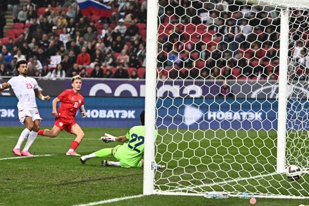 Russia Soccer Friendly Russia - Iran 9253968 29.09.2026 Russia s Aleksandr Golovin scores a goal against Iran s goalkeeper Hossein Hosseini during the friendly soccer match between Russia and Iran at Ak Bars Arena stadium, in Kazan, Republic of Tatarstan, Russia. Maksim Bogodvid Sputnik Kazan Republic of Tatarstan Russia  Copyright: xMaksimxBogodvidx