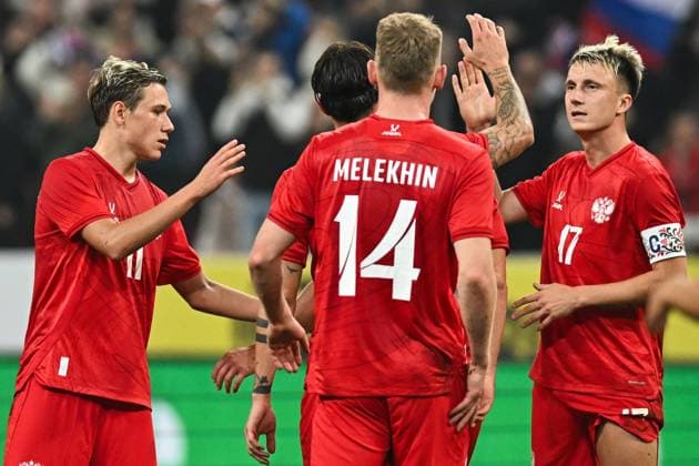 Russia Soccer Friendly Russia - Iran 9253980 29.09.2026 Russia s Aleksandr Golovin, right, celebrates his goal with teammates during the friendly soccer match between Russia and Iran at Ak Bars Arena stadium, in Kazan, Republic of Tatarstan, Russia. Maksim Bogodvid Sputnik Kazan Republic of Tatarstan Russia  Copyright: xMaksimxBogodvidx