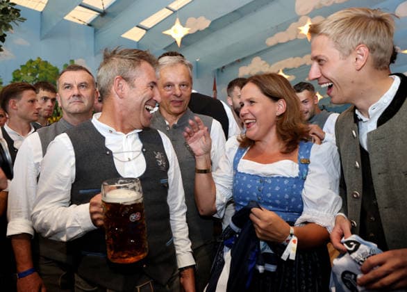 Soccer, Men s, Bavarian Regional League, 2026–2027 Season, TSV 1860 Munich, Official Oktoberfest Visit, Hacker Festzelt Gernot Mang, President of TSV 1860 Munich, with Verena Dietl, 3rd Mayor of the City of Munich, and Dominik Krause, Mayor of the City of Munich; from left to right: in good spirits, laughing, smiling