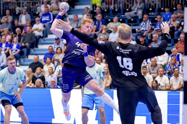 September 29, 2026, Handball, EL, VfL Gummersbach vs. PGE Wybrzeza Gdansk, Matchday 1 of the EHF European League, 2026–27 Men’s Season, Schwalbe Arena: Tomasz Gebala (PGE 48) shoots the ball at the goal defended by Bertram Obling (VfL Gummersbach 16), North Rhine-Westphalia, Germany