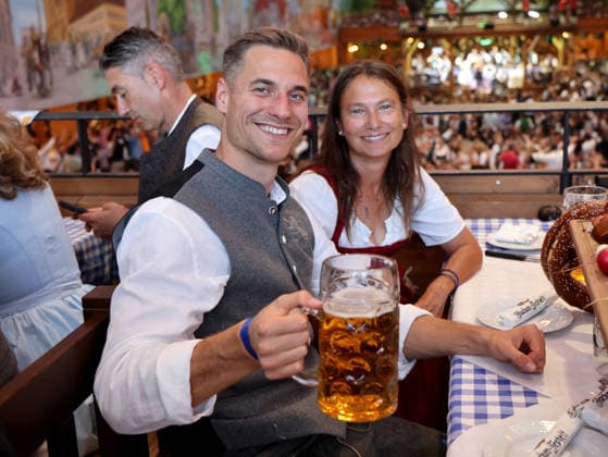 Soccer, Men s, Bavarian Regional League, 2026–2027 Season, TSV 1860 Munich, Official Oktoberfest Visit, Hacker Festzelt: Dennis Dressel of TSV 1860 Munich holding a Maß of beer