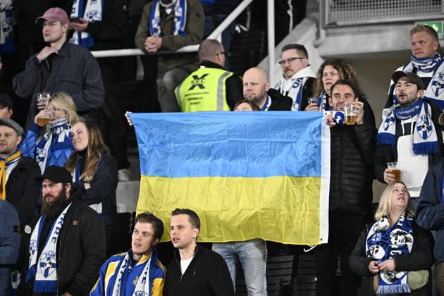 Spectators hold Ukrainian flag as support for Ukraine during the UEFA Nations League League C Group C1 football match between Finland and Belarus in Helsinki, Finland, on September 29, 2026. - RONI REKOMAA Helsinki Finland 7B79YJO3O0I  Copyright: xRonixRekomaax 7B79YJO3O0I