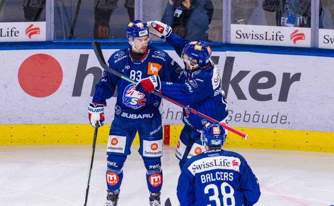 Ice Hockey National League Regular Season: ZSC Lions vs. EHC Bie Zurich, Switzerland, September 29, 2026, 5th minute, 83 Juho Lammikko of the ZSC Lions scores to make it 2–0; 14 Chris Baltisberger and 38 Rudolf Balcers, both of the ZSC Lions, celebrate with the goal scorer Copyright: xAndreasxHaasx