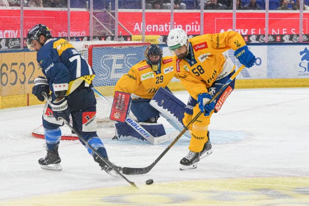 September 29, 2026, Quinto, Gottardo Arena, NL HC Ambri-Piotta vs. HC Davos 58 Frederic Allard (Davos) vs. 77 Michael Joly (Ambri-Piotta) Quinto, Gottardo Arena, Ticino, Switzerland Copyright: xJustPictures.ch JarixPestelaccix jp-en-JaPe-JP6_JAr_NL_HCAP_HCD_29Sep2026_000016
