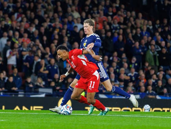 29.09.2026 Scotland v Switzerland, UEFA Nations League, League Stage : Jack Hendry brings down Dan Ndoye and recives a red card as a result  Copyright: xKennyxRamsay.Scotlandx NINTCHDBPICT001112140846