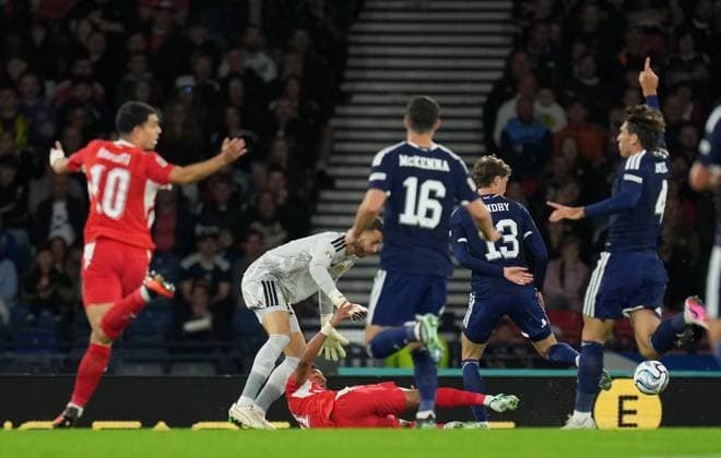 Dan Ndoye of Switzerland is fouled by Jack Hendry of Scotland as he runs towards goal. Referee Nenad Minakovic sent Hendry off for the challenge following a VAR review. Scotland v Switzerland, Football, UEFA Nation s League, Group B1, Hampden Park, Glasgow, UK, Hampden Park, Glasgow, Scotland, Scotland, UK - 29 Sep 2026Glasgow Hampden Park Scotland United Kingdom Copyright: xStuartxWallace Shutterstockx 17176216au