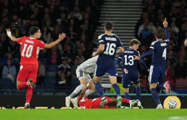 Dan Ndoye of Switzerland is fouled by Jack Hendry of Scotland as he runs towards goal. Referee Nenad Minakovic sent Hendry off for the challenge following a VAR review. Scotland v Switzerland, Football, UEFA Nation s League, Group B1, Hampden Park, Glasgow, UK, Hampden Park, Glasgow, Scotland, Scotland, UK - 29 Sep 2026Glasgow Hampden Park Scotland United Kingdom Copyright: xStuartxWallace Shutterstockx 17176216av
