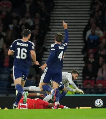 Dan Ndoye of Switzerland is fouled by Jack Hendry of Scotland as he runs towards goal. Referee Nenad Minakovic sent Hendry off for the challenge following a VAR review. Scotland v Switzerland, Football, UEFA Nation s League, Group B1, Hampden Park, Glasgow, UK, Hampden Park, Glasgow, Scotland, Scotland, UK - 29 Sep 2026Glasgow Hampden Park Scotland United Kingdom Copyright: xStuartxWallace Shutterstockx 17176216ay