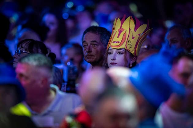 RECORD DATE NOT STATED 29th September 2026; Mattioli Arena, Leicester, England; PDC World Grand Prix Darts, Day 2; A fan wears a Damon Heta hat as she watches the darts GodfreyxPitt