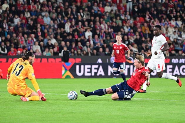 From left goalkeeper James Trafford of England, Pavel Sulc of Czechia and Marc Guehi of England in action during the UEFA Nations League, A3 group 2nd round match Czech Republic vs England, on September 29, 2026, in Prague, Czech Republic. (CTKxPhoto MichalxKamaryt) CTKPhotoP2026092908468  CTKPhotoP2026092908468