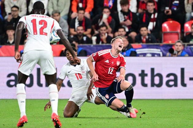 From left Trevoh Chalobah and Myles Lewis-Skelly of England and Lukas Cerv of Czechia in action during the UEFA Nations League, A3 group 2nd round match Czech Republic vs England, on September 29, 2026, in Prague, Czech Republic. (CTKxPhoto MichalxKamaryt) CTKPhotoP2026092908768  CTKPhotoP2026092908768